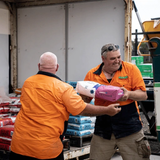 Helping a customer load bags